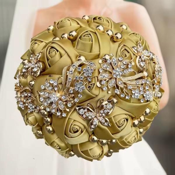 beautiful gold/olive satin rose bouquet with rhinestone butterflies and floral jewelry accents.