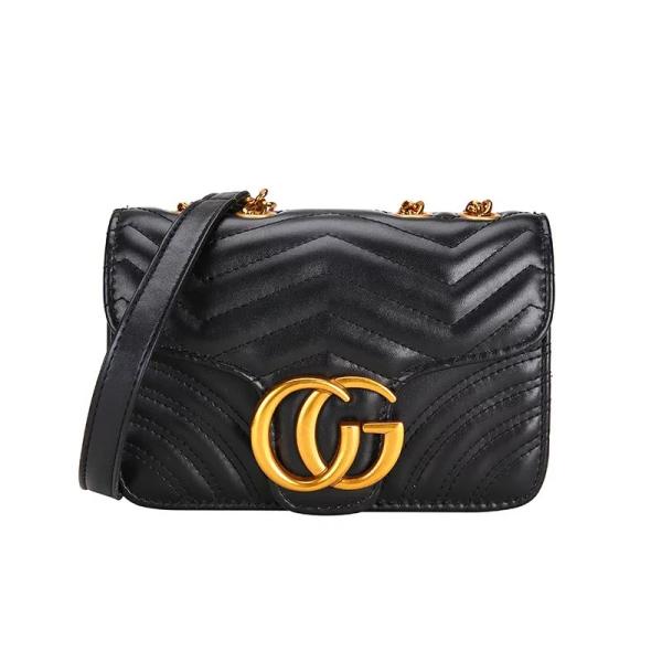 pink quilted shoulder crossbody bag with a gold tone chain strap and gold tone double G style hardware